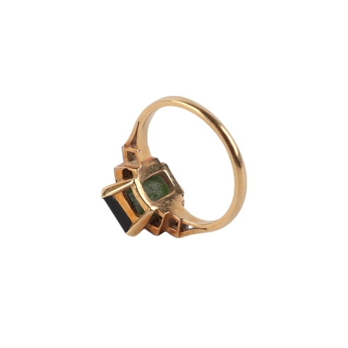 546 - An 18ct gold ring set with a large green stone and diamond set shoulders, approx UK size K, 3.5g.