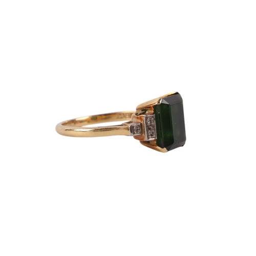 546 - An 18ct gold ring set with a large green stone and diamond set shoulders, approx UK size K, 3.5g.