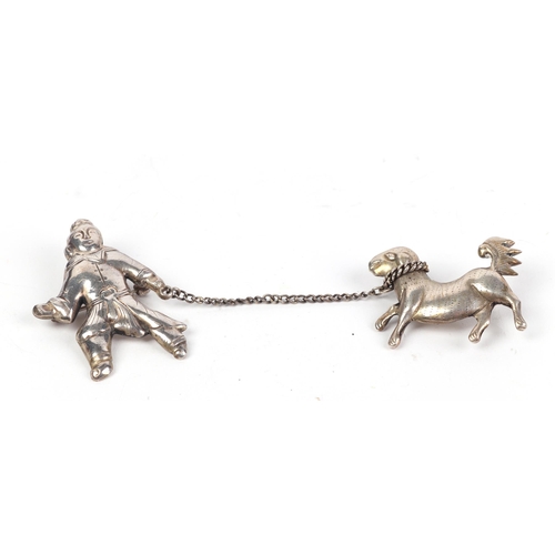 549 - A Chinese silver double brooch in the form of a man with a dog on a lead; together with a silver col... 