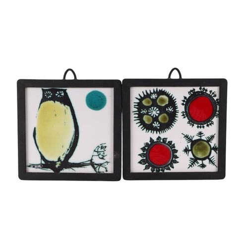 55 - A pair of mid-century pottery tiles designed by Ann Wynn Reeves, in original cast iron suspension fr... 