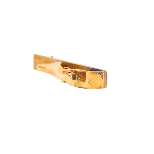 558 - A pair of Chinese gold cufflinks and matching tie clip, marked 14k, gross weight 17g.