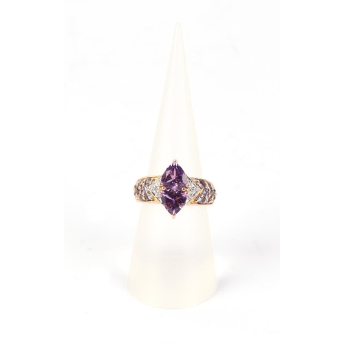 579 - A 9ct gold amethyst and diamond dress ring, approx UK size L, 4.2g.