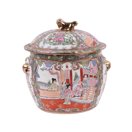 581 - A Chinese famille rose pot and cover, 22cms high; together with a Chinese blue and white vase, 26cms... 