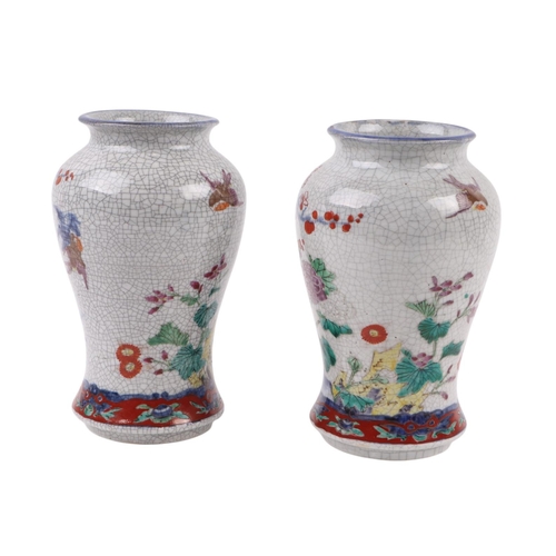 581 - A Chinese famille rose pot and cover, 22cms high; together with a Chinese blue and white vase, 26cms... 