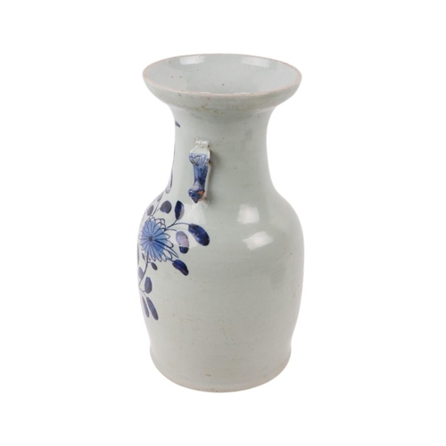 593 - A Chinese blue & white baluster vase with dog of fo handles, decorated with a butterfly within flowe... 