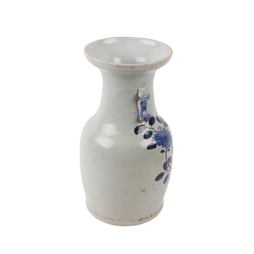 593 - A Chinese blue & white baluster vase with dog of fo handles, decorated with a butterfly within flowe... 