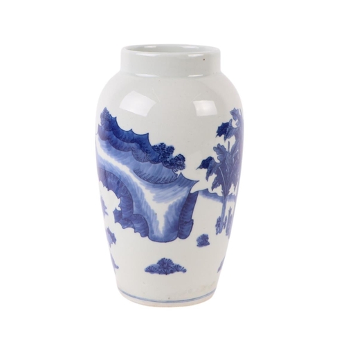 595 - A Chinese blue & white baluster vase decorated with figures within a landscape scene, 23cms high.