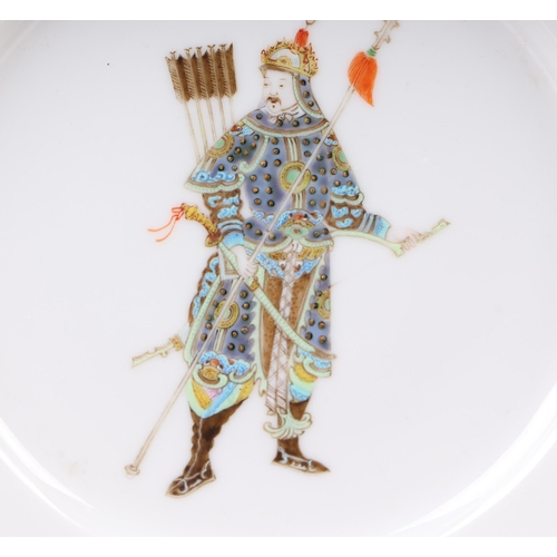 604 - A 19th century Chinese porcelain dish decorated with a depiction of an archer, 22cms diameter.