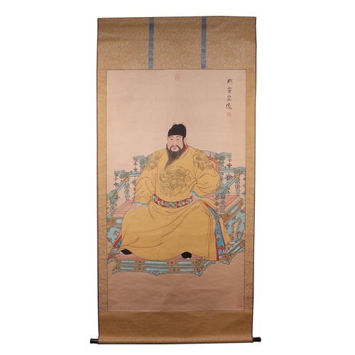 607 - A Chinese scroll painting depicting an ancestor, with calligraphy, 92 by 195cms.