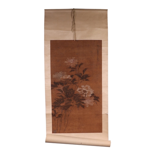 609 - A Chinese scroll painting depicting peonies, overall 60 by 151cms.