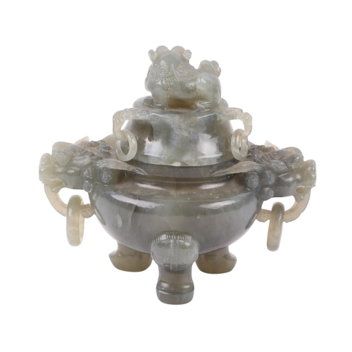 616 - A Chinese figured green hardstone censer with lion mask handles and fo dog finial, 15cms high.