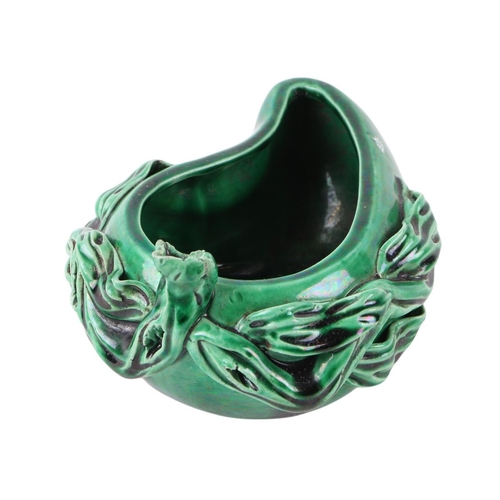 628 - A green glazed pottery brush washer in the form of a pepper, 11cms long.