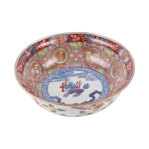 629 - A Chinese Imari palette bowl decorated with dragons and mythical beasts, six character blue mark to ... 