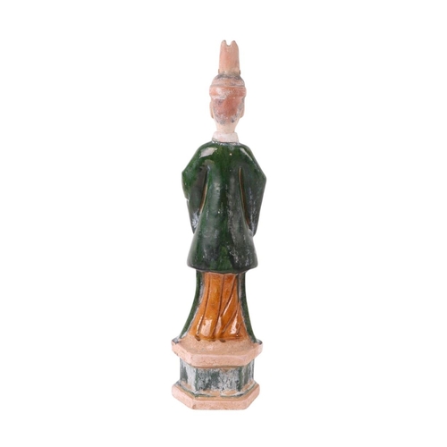 637 - A Chinese pottery funeral or temple figure, 50cms high.