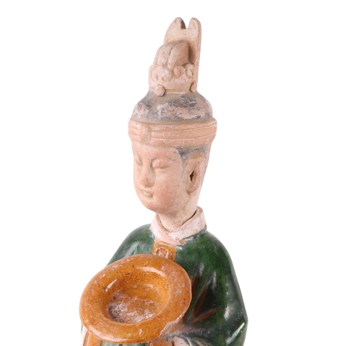 637 - A Chinese pottery funeral or temple figure, 50cms high.