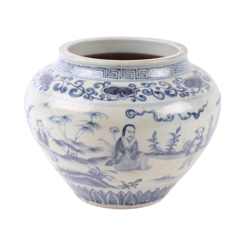 645 - A Chinese blue & white vase decorated with figures in a landscape, 16cms high.