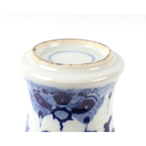 648 - A Chinese blue & white baluster vase decorated with figures in a landscape, 25cms high.