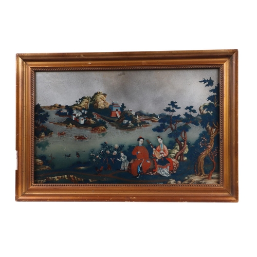 653 - A Chinese reverse decorated silvered mirror picture depicting a courting couple beside a lake, frame... 