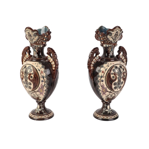 66 - A pair of late 19th century Austrian majolica pottery twin-handled pedestal baluster vases by Julius... 