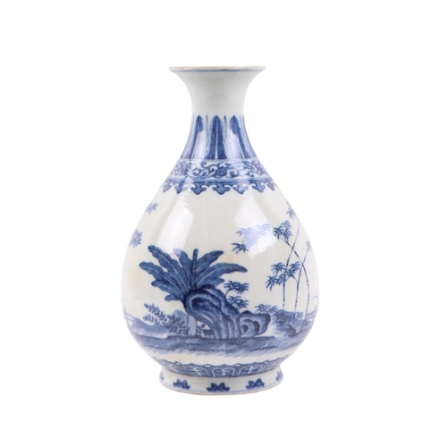 662 - A Chinese blue & white vase decorated with bamboo and foliage on a terrace, blue seal mark to the un... 