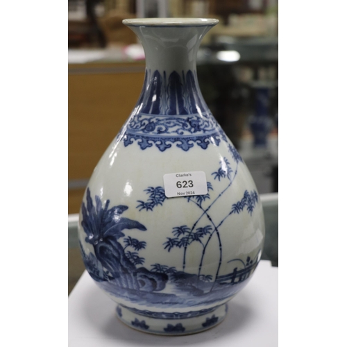 662 - A Chinese blue & white vase decorated with bamboo and foliage on a terrace, blue seal mark to the un... 