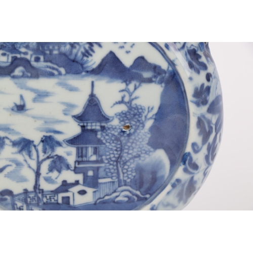 667 - A Chinese blue & white moon flask decorated with a river landscape scene, 22cms high.