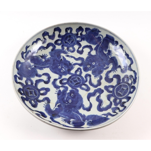 671 - A Chinese blue & white charger decorated with foliate scrolls, 37cms diameter; together with a Chine... 