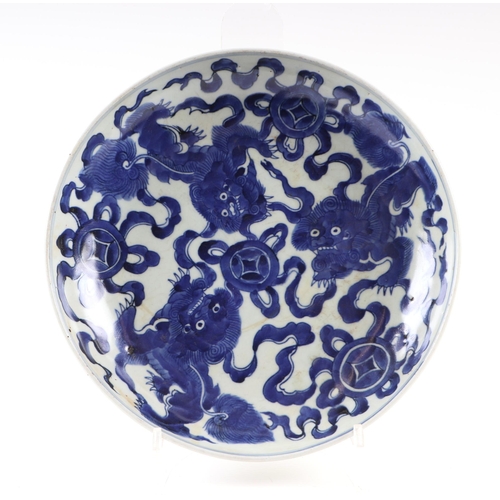 671 - A Chinese blue & white charger decorated with foliate scrolls, 37cms diameter; together with a Chine... 