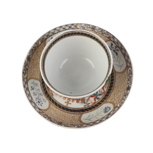 676 - An 18th century Chinese Export tea bowl and saucer decorated with an Armorial crest dated 1783, 4.5c... 