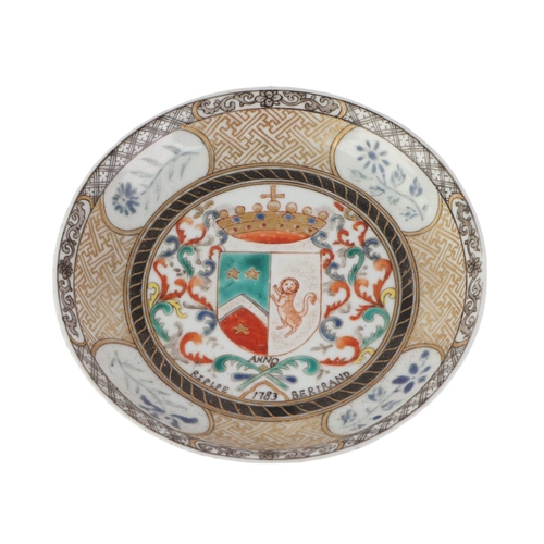 676 - An 18th century Chinese Export tea bowl and saucer decorated with an Armorial crest dated 1783, 4.5c... 