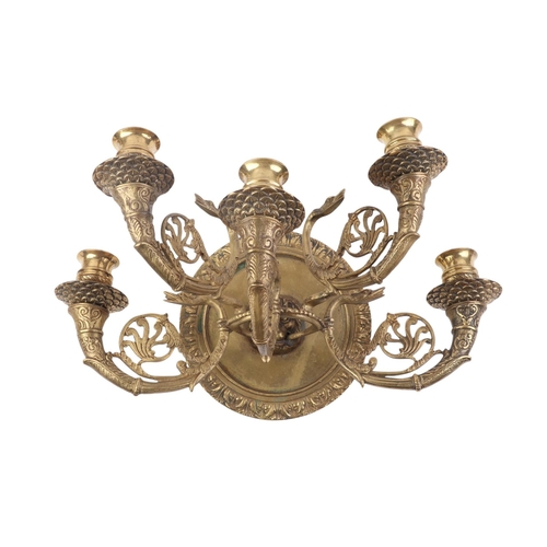 678 - A pair of five-branch bronze wall sconces, 37cms wide (2).