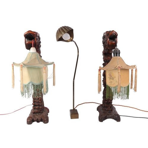 682 - A pair of 1930's Chinese carved wooden dragon table lamps, 52cms high; together with a brass desk la... 