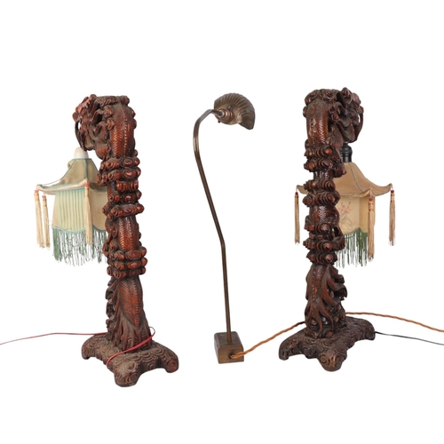 682 - A pair of 1930's Chinese carved wooden dragon table lamps, 52cms high; together with a brass desk la... 