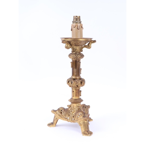 698 - A gilt bronze table lamp in the form of a German medieval pricket candlestick, 37cms high.