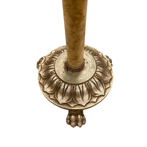 700 - A French giltwood and fabric standard lamp on lion paw feet, 130cm high.