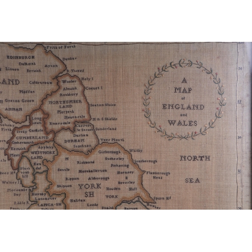 706 - An embroidered sampler entitled 'A Map of England and Wales', framed & glazed, 54 by 65cms.