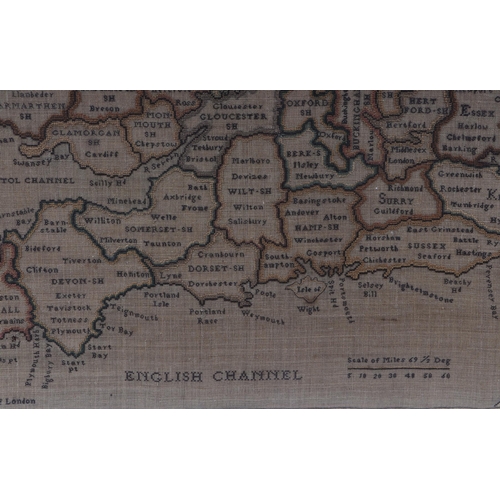 706 - An embroidered sampler entitled 'A Map of England and Wales', framed & glazed, 54 by 65cms.