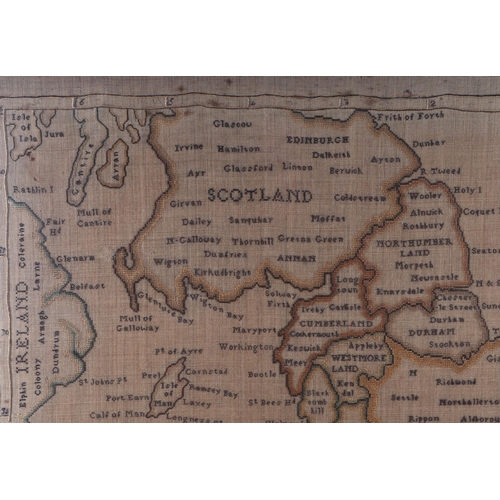 706 - An embroidered sampler entitled 'A Map of England and Wales', framed & glazed, 54 by 65cms.