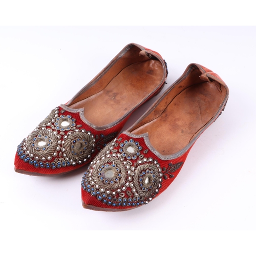 707 - A pair of Turkish slippers with bullion wire decoration; together with a Regency style silk jacket a... 