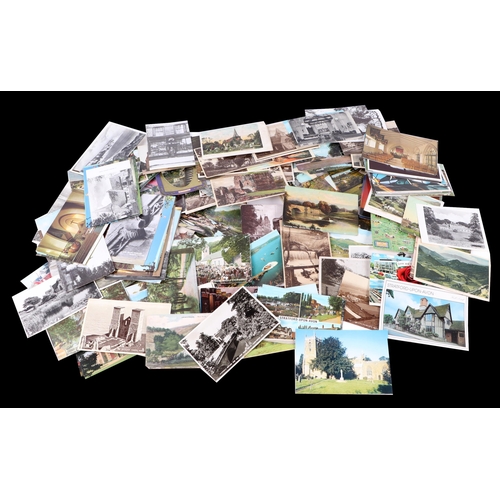 713 - A large quantity of postcards, loose and in albums to include topographical, Edwardian birthday and ... 