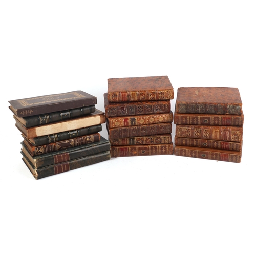 714 - A quantity of 18th century and later leather bound books.