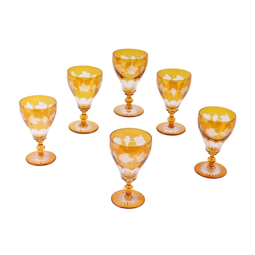 732 - A set of six Bohemian amber flashed and etched glass goblets, each 15cms high (6).