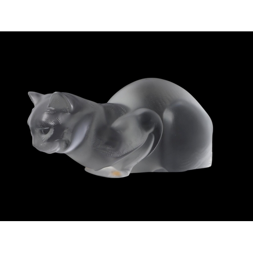 741 - A Lalique frosted glass figure depicting a crouching cat, numbered 1160200 with etched signature to ... 