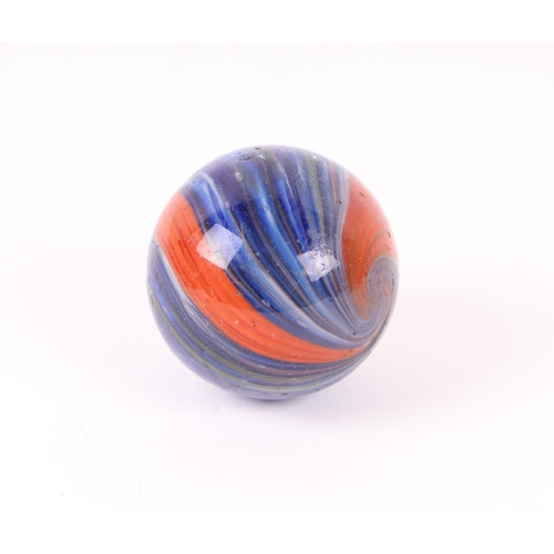 745 - A large Victorian onion skin glass marble, predominantly blue / red, approx 4cms diameter.