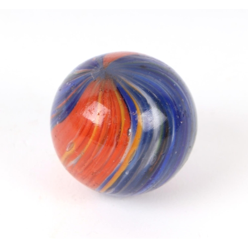 745 - A large Victorian onion skin glass marble, predominantly blue / red, approx 4cms diameter.