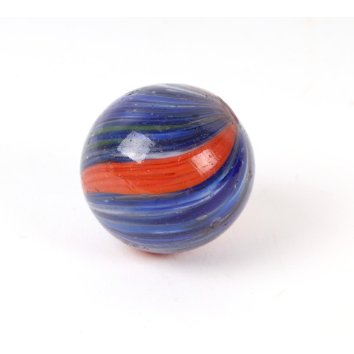 745 - A large Victorian onion skin glass marble, predominantly blue / red, approx 4cms diameter.