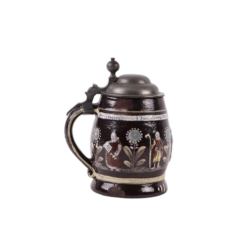 750 - A German Creussen stoneware apostle stein with pewter lid, dated 1627, 15cms high.