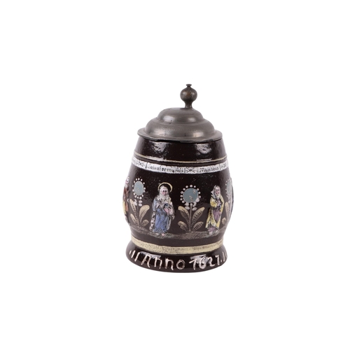 750 - A German Creussen stoneware apostle stein with pewter lid, dated 1627, 15cms high.