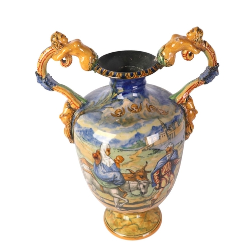 756 - A large Cantagalli style twin-handled vase decorated with classical scenes, 39cms high.