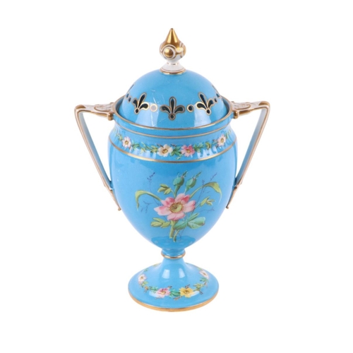 761 - A Victorian porcelain pot pourri vase and cover decorated with flowers, on a turquoise ground, appro... 